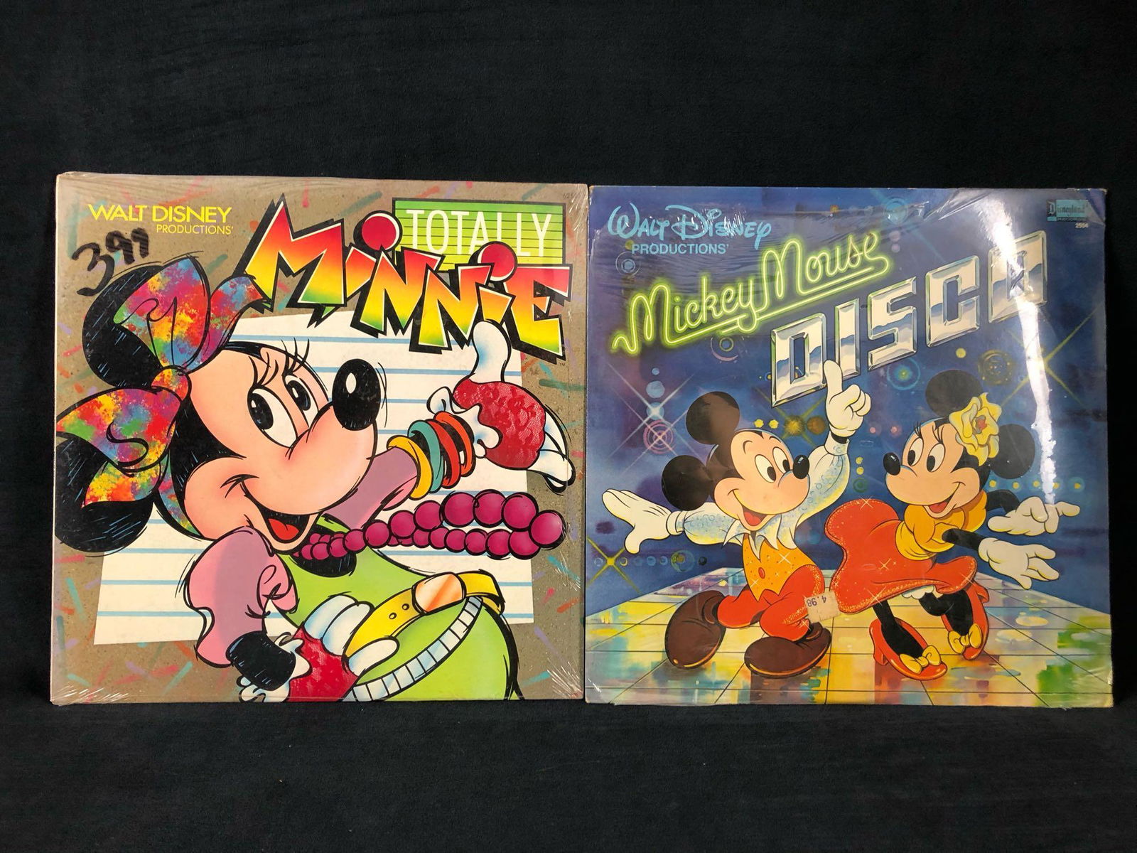 Lot Of 2 Sealed Walt Disney Productions Mickey Mouse: Lot Of 2 Sealed Walt Disney Productions Mickey Mouse Minnie 70's 80's Album Vinyl Sealed Disneyland This lot features two vintage Walt Disney characters singing to the 80's and 70's. In excellent cond