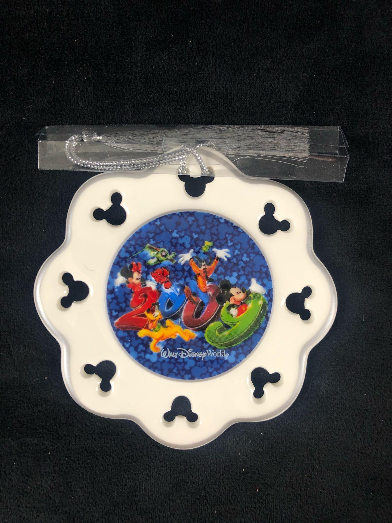 A Lot Of 17 Disney Walt Disney World Mickey Christmas: A Lot Of 17 Disney Walt Disney World Mickey Christmas 2009 Collectors Ceramic Ornament A lot of 17 in the box Walt Disney World Mickey Christmas ceramic 2009 collectors ornament. The front of the orna