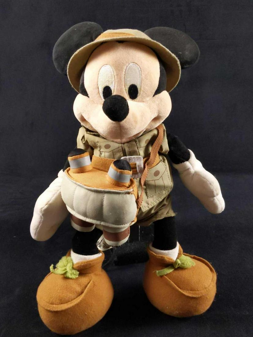 Disney Micky Mouse Plush with Binoculars: Disney Adventureland Micky Mouse Plush with Binoculars. Mickey Mouse looks ready for an adventure! Cute plush us approx 11" x 15". Originally sold at the Disney Resort Parks. Mickey is in good, used c