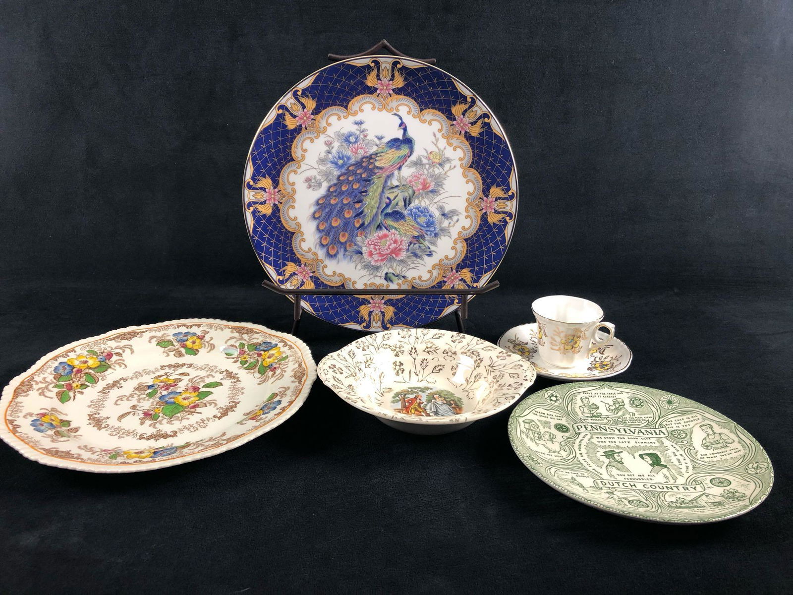 Vintage Lot Of Mixed Plates & Teacup: Vintage Lot Of Mixed Plates & Teacup. This lot is very good condition includes the following. Royal Grafton Bone China Tea Cup And Dish Pennsylvania 7" Collectors Plate Apple Blossom Plate 10" Warrant