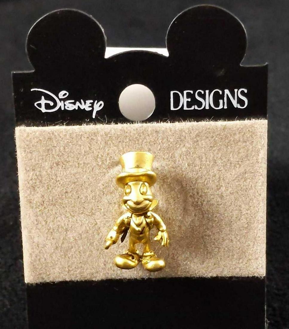 Cast Member Jiminy Cricket Environmentality Pin F: Cast Member Jiminy Cricket Environmentality Award. This pin was awarded to WDW Cast Members for being a part of an Environmentality program. Disney stopped giving this pin out in 1999. Pin and backing