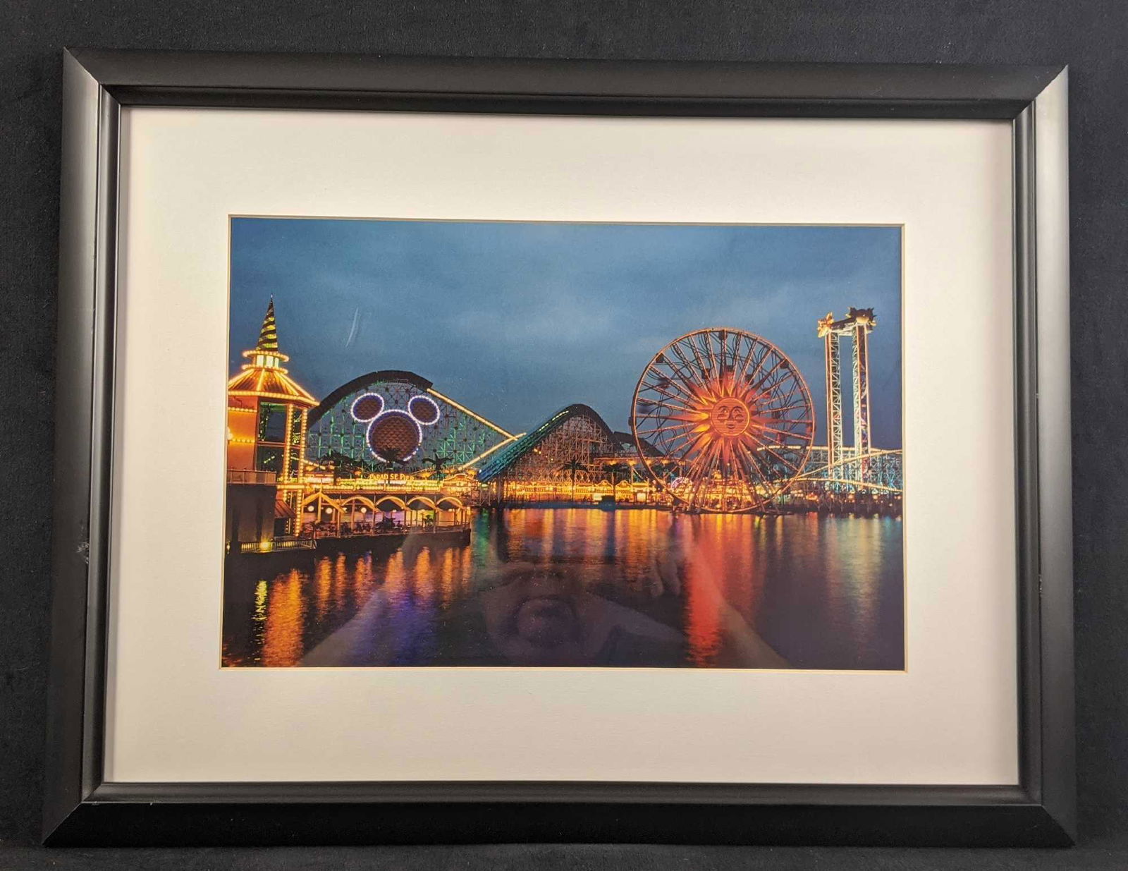 Framed Disney California Adventures Paradise Pier: A framed photo of Disney's California Adventures' Paradise Pier along with their famous wooden coaster, the California Screamin'. 'Was given exclusively to cast members at the Disney resort. Framed ar