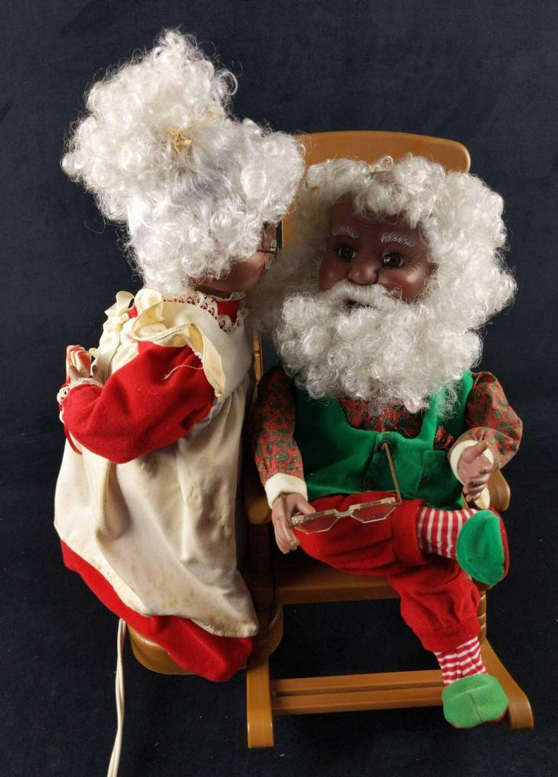 Rare Animated Santa Claus Mrs Claus Kissing Figure: Rare 'Santa's Best' animated Santa Claus And Mrs Claus ('African American Variation'). When plugged in and turned on, Mrs Claus plants a kiss on Santa's cheek. This is al animated as Mrs Claus slowly 