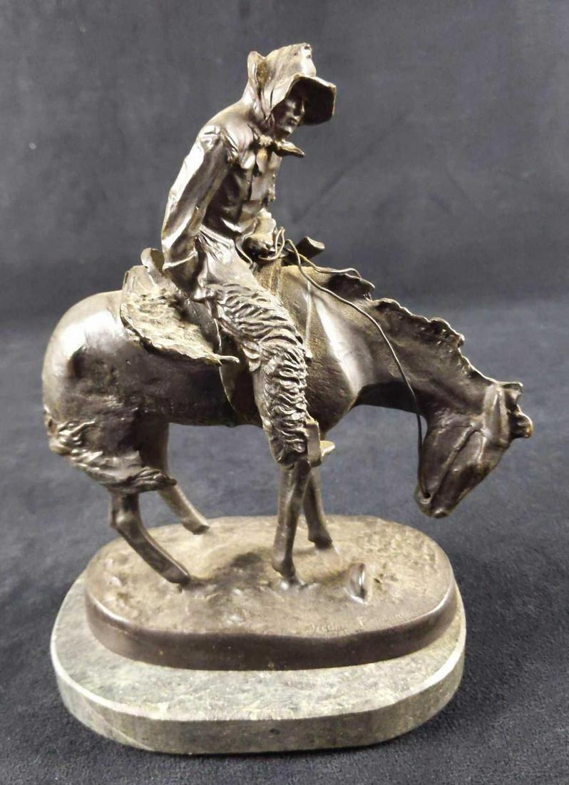 Norther Mini Bronze Figurine Frederic Remington: This Norther bronze depicts the hard lifestyle of a cowboy in the colder seasons. In a successful attempt to capture the harsh conditions of weather and season on the lives and livelihoods of the west
