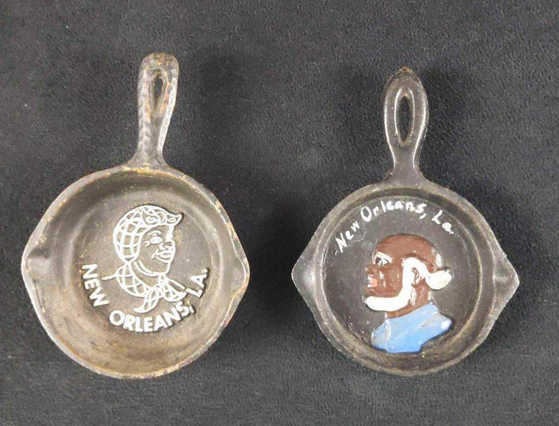 Vintage 2 Cast Iron Mini Frying Pans: This lot includes: (1) John Wright Cast Iron Mini Frying Pan. New Orleans, LA with hand-painted Bald, Gray Bearded Old Man image. From the 1940s and 1950s. Is approx 3" x 4 1/2" x 1/2". (1) Cast Iron