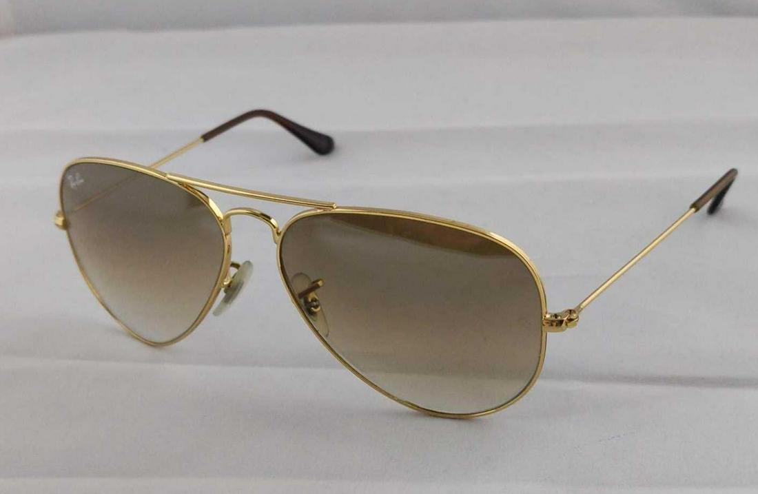 Ray Ban Aviator Sunglasses With Case: Ray-Ban Aviator gradient sunglasses encompass the teardrop shape that started it all. Originally designed for U.S. aviators, the Aviator Sunglasses design has become an icon. These are standard-sized