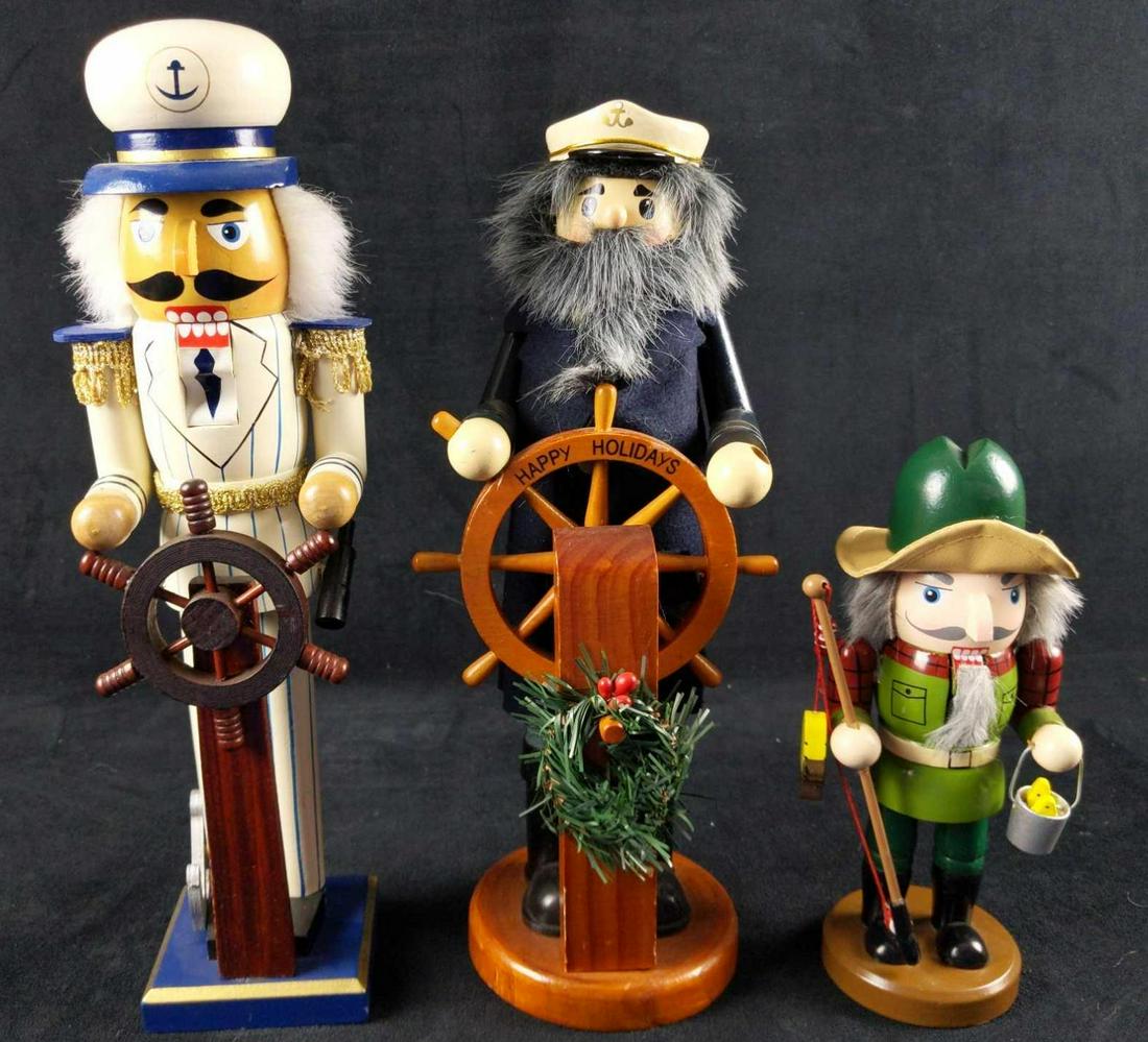 Three Wooden Sea And Boat Themed Nutcrackers: Nutcrackers are not just for land-lubbers anymore! This sea-worthy set of salty nutcrackers consists of: (1) Captain Wooden Nutcracker. This old sailor is wishing you a happy holiday! Please note, the