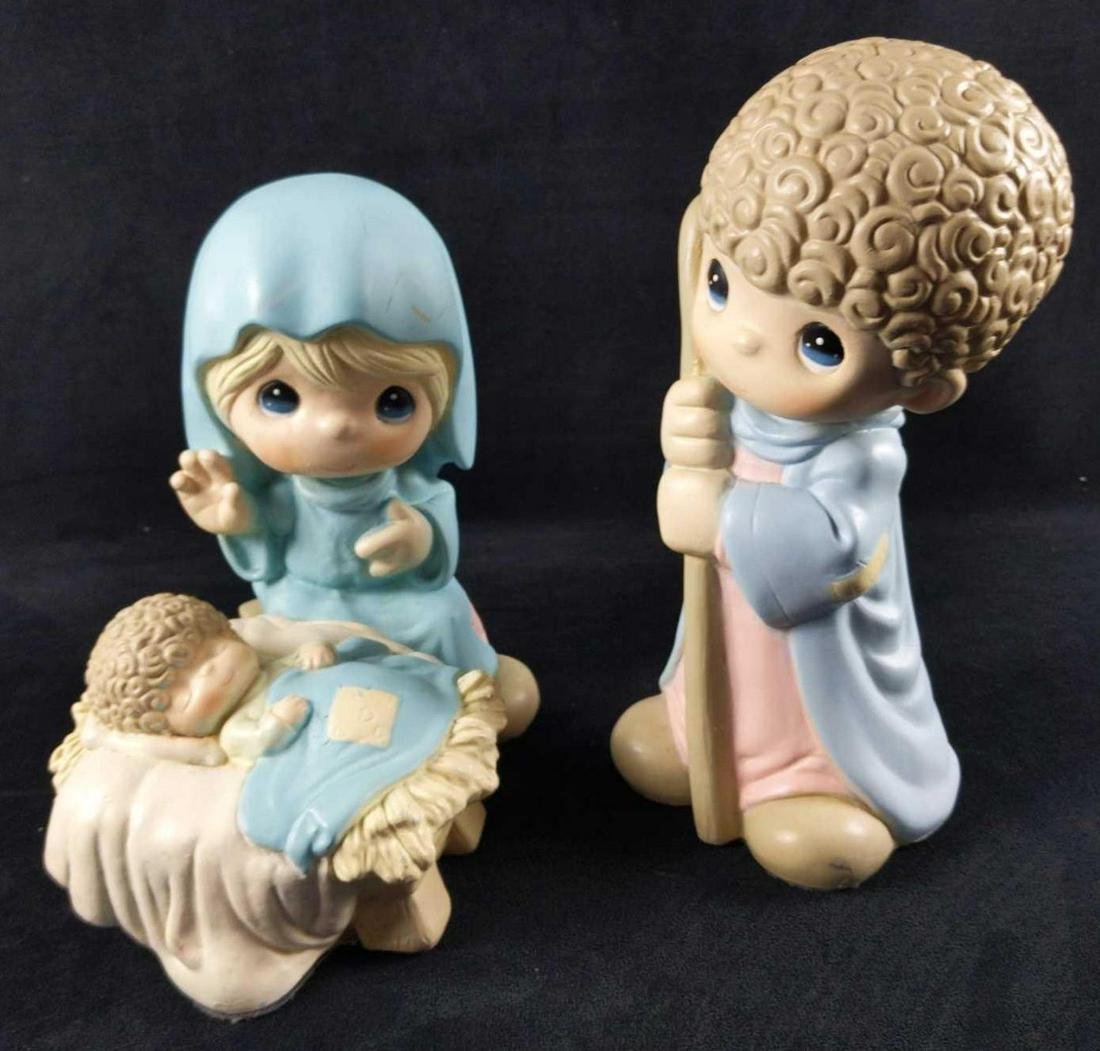 Precious Moments Nativity Set Jesus Mary Joseph: Large resin figurines of Mary, Joesph and Baby Jesus all done in the "Precious Moments" Style. These were put out in 1999. Figurines are in good, used condition with some wearing and markings. These a