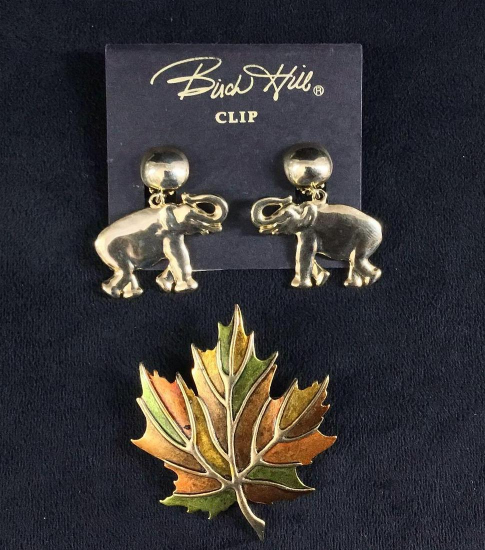 Birch Hill Elephant Earrings Vintage Leaf Brooch: Birch Hill Elephant Earrings Vintage Leaf Brooch. This is a lot of two modern costume jewelry pieces. They are in good condition with some known scuffs. In total this lot consists of the following; (1