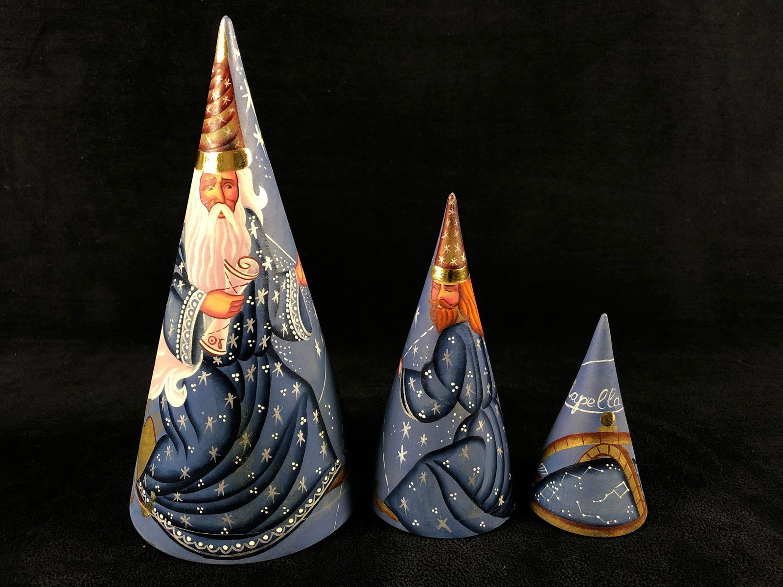 Hand Painted Wood Cone Russian Matryoshka Nesting Dolls: This very detailed set of 7" 3pc cone nesting dolls are in Mint condition with no issues or missing pieces. Signed by the artist underneath. Please see all our pictures they are part of our descriptio