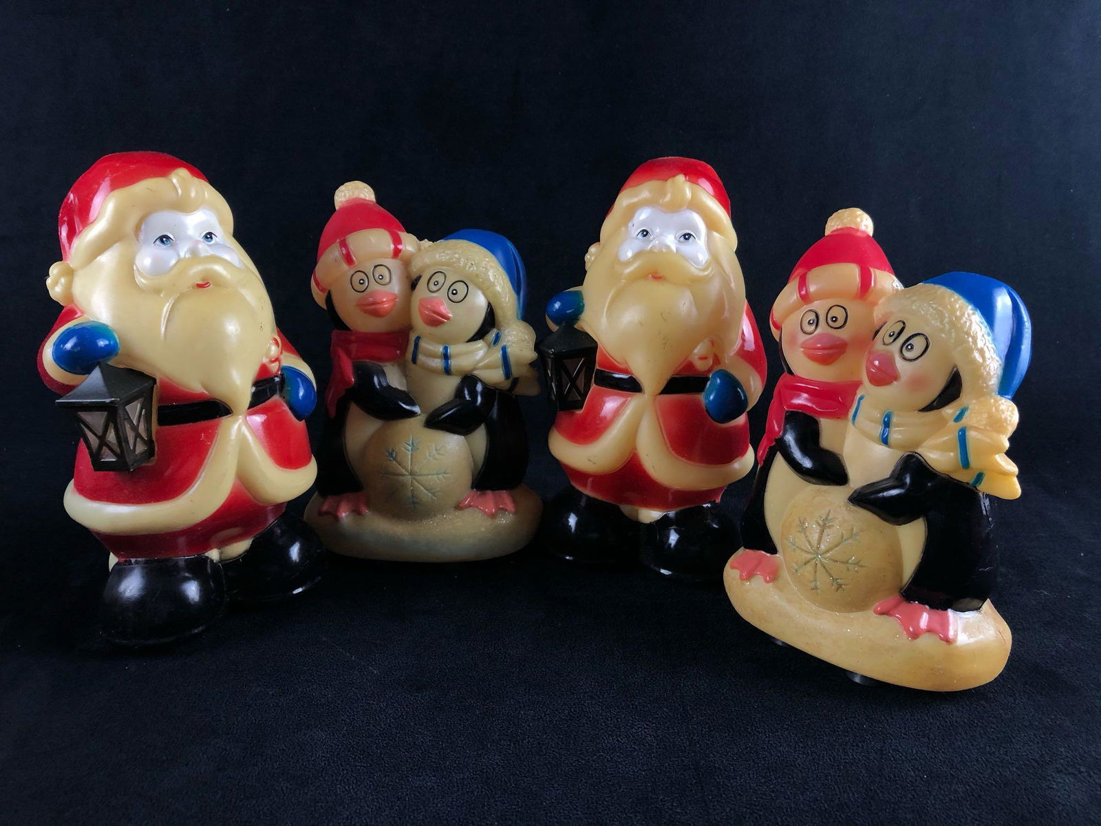 Vintage 1980's Santa's & Penguin's Blow Mold's 7": Vintage 1980's Santa's & Penguin's Blow Mold's 7" Figures Lot Of 4 .These fun festive classic blow molds are in very good condition with very little fading no cracks or dents.