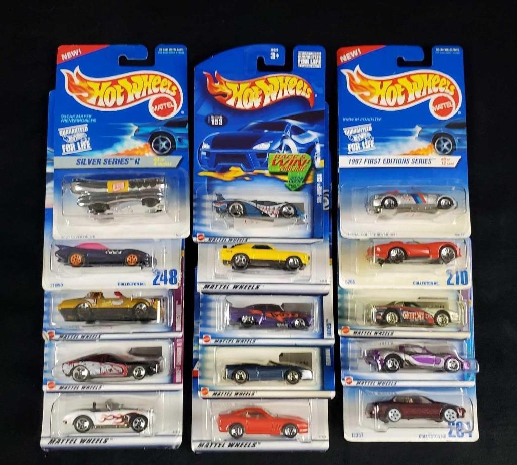 Hot Wheels Packaged Die Cast Cars Lot Of Fifteen E: Here is a lot of fifteen super-cool Mattel Hot Wheels Die-Cast Metal Cars. These are all in their original packaging and the majority are in good condition with a few having some shelf-wear. Most have