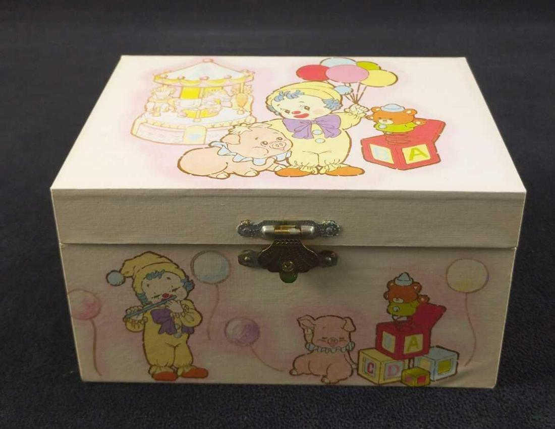 Vintage Jewelry Music Box With Ballerina: Vintage Jewelry Music Box With Ballerina. Made of light wood and features a clown kid and a sassy pig. Wind up in the back and when you open it up, a ballerina spins while London Bridge Is Falling Dow