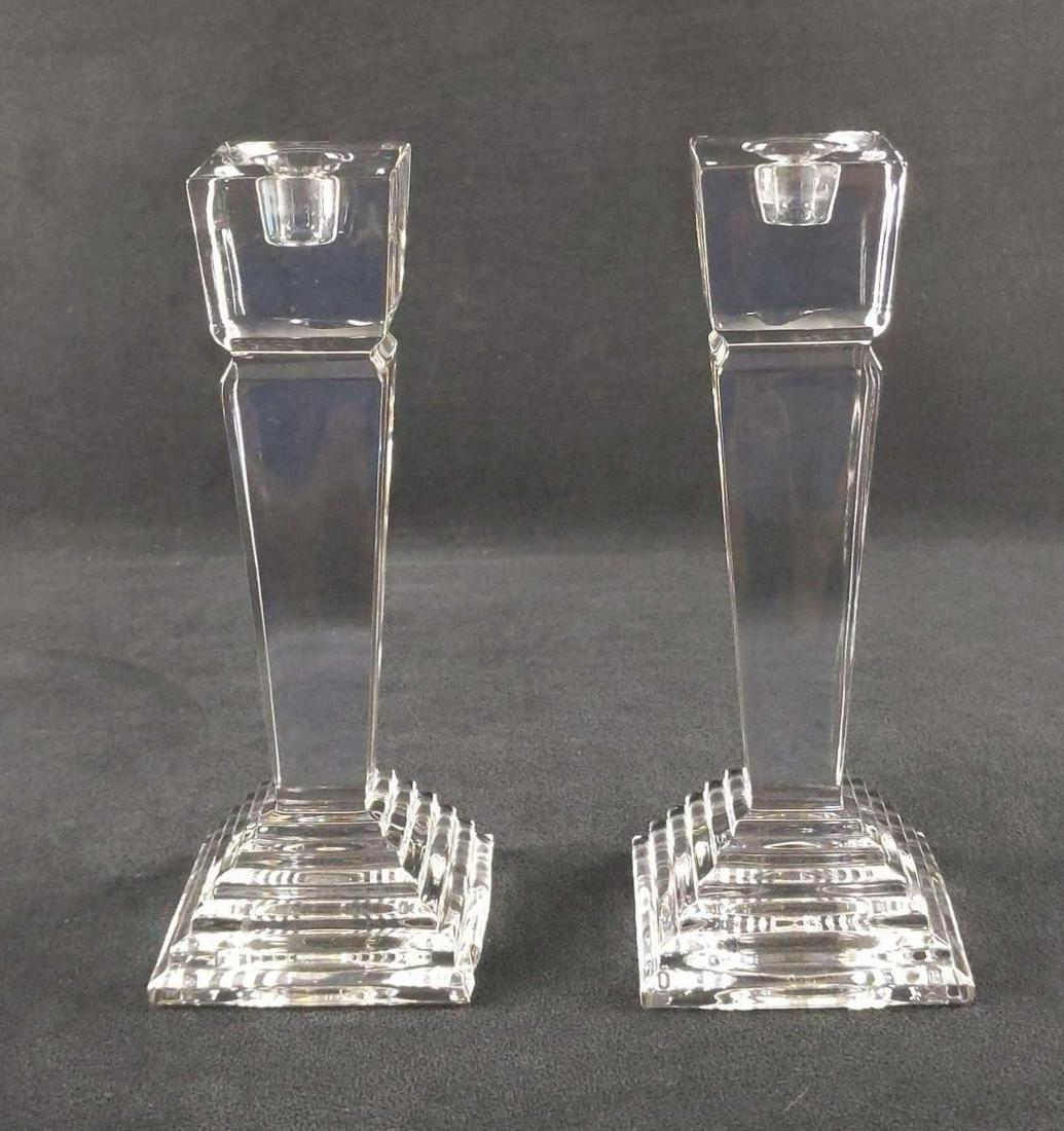 2 Lenox Lead Crystal Ovations Pillar Candlesticks: Set Of Two Lenox Lead Crystal "Ovations" Pillar Candlesticks. Made in Germany. They are approx 3 1/2" x 3 1/2" x 8 1/4". Candlesticks are in good, used condition with one having a chip on the side of 