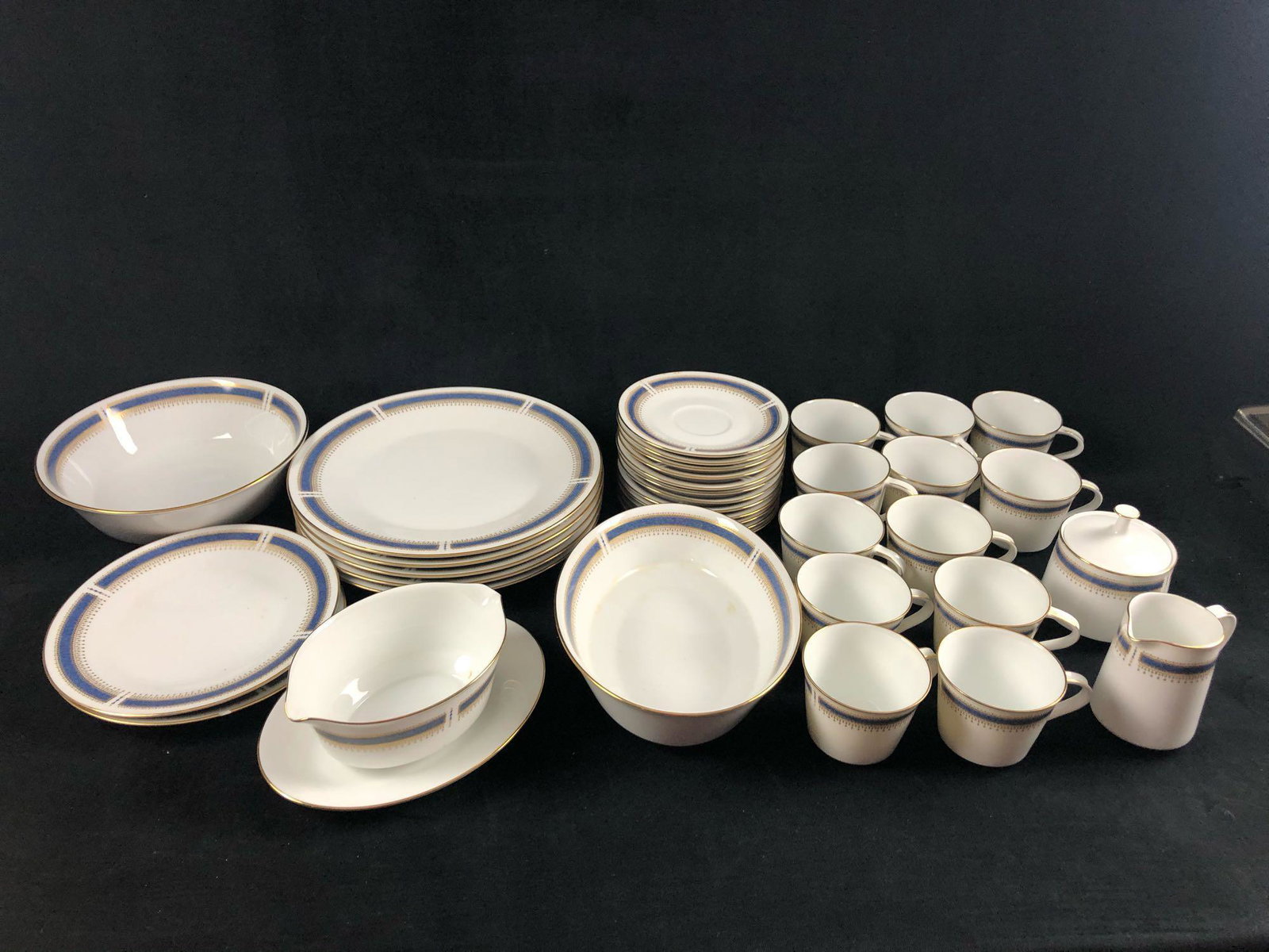 Noritake 36 Piece Porcelain 6611 Blue Dawn 1950: This lot features Noritake Noritake 36 Piece Porcelain 6611 Blue Dawn 1950. Made in China. There are no known cracks, chips or crazing. There are some known chips and minor repairs on some of the item
