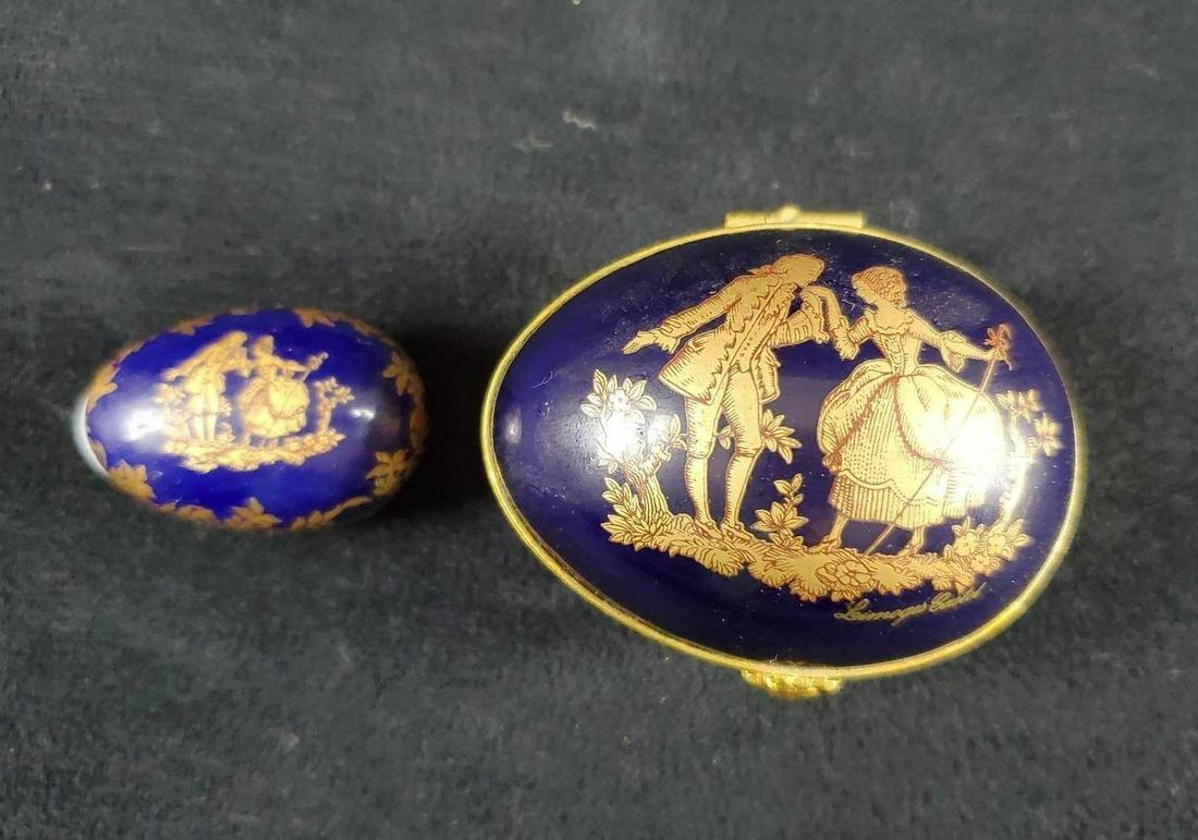 Vintage French Porcelain Cobalt Gold Trinket Egg: Limoges France, cobalt blue and gold colored porcelain with an image of an courting couple trinket box and small cobalt and gold porcelain pill box. Also comes with an gold colored funnel. Trinket box