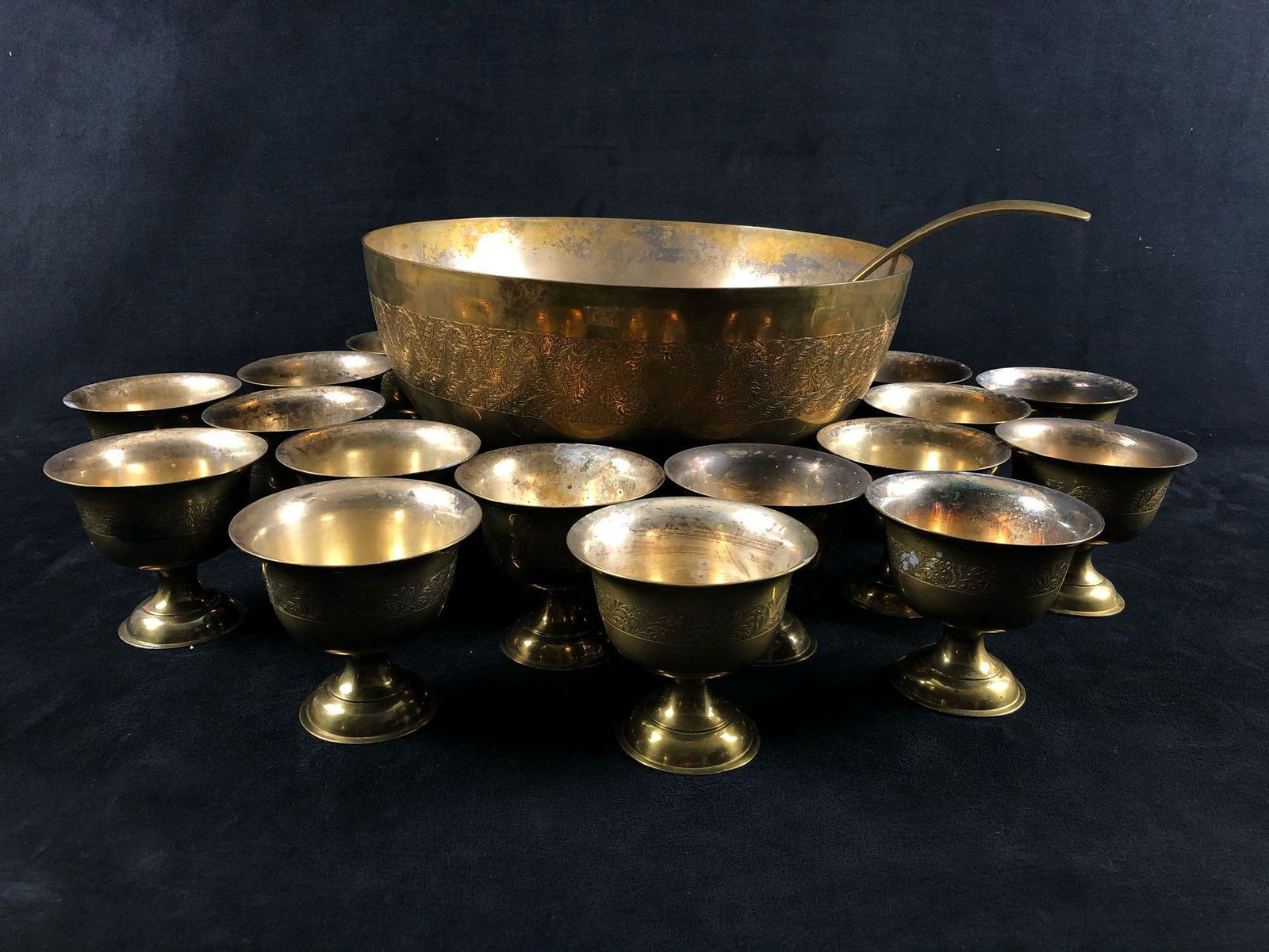 Vintage Solid Brass & Silver Plate Lined Etched Punch: Vintage Solid Brass & Silver Plate Lined Punch Bowl - Ladle - Cup Set . This wonderful set is in great condition with need of a good polish no dents or dings .Includes the following : 11.5 LBS 1 punch