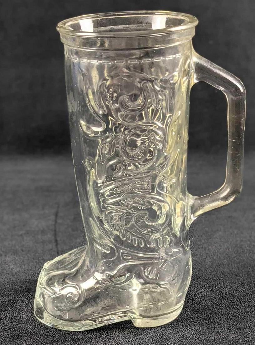 Anchor Hocking Glass Western Boot Beer Mug B: The Anchor Hocking Western boot beer mug is a fun and unusual way to serve beer, soda floats, and desserts! The 12-1/2 oz capacity is perfect for small to medium applications or for use as a decorativ