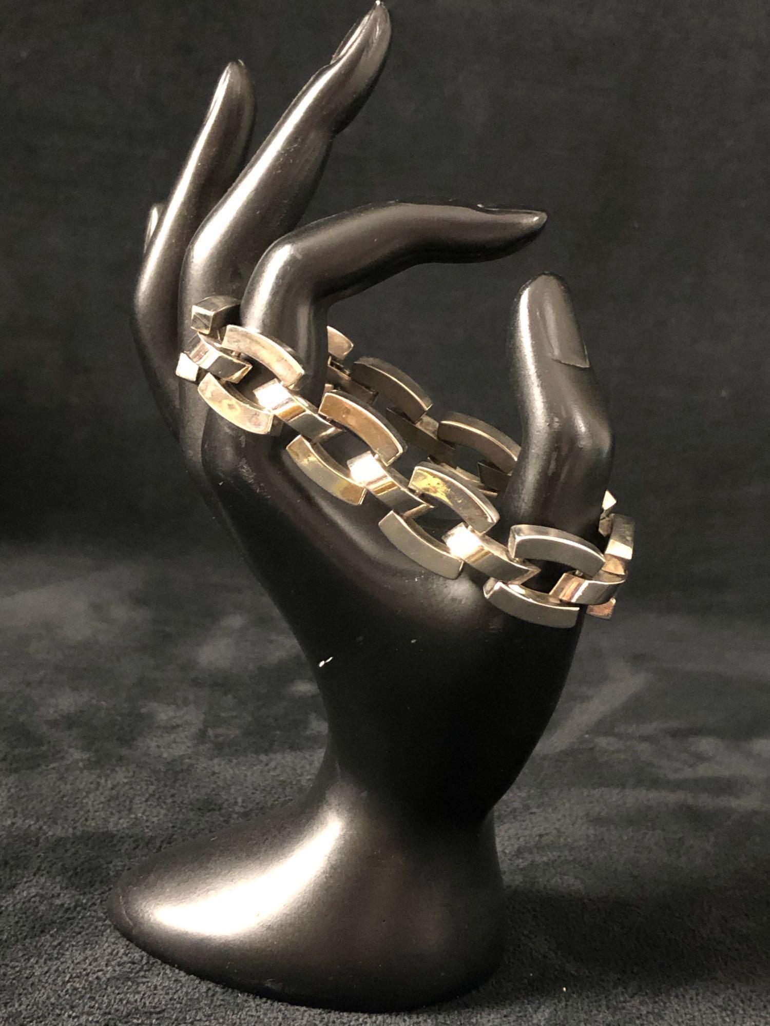 Unisex Panther Link Stainless Bracelet: Vintage unisex panther link bracelet made from stainless steel. Measure 7.5" x 1/2" and weighs 54.4 grams. In very good condition with some signs of wear.