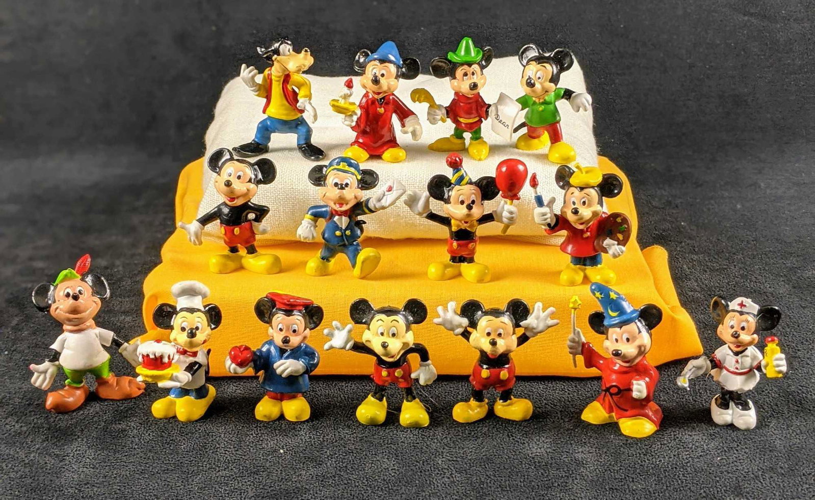 Vintage Disney PVC Mickey Figurines By Monogram: This is the idea lot for Mickey Mouse fans. This lot includes sixteen PVC figures of Mickey and some of this friends. These were produced by a company called Monogram Products Inc in Naples, Florida. 