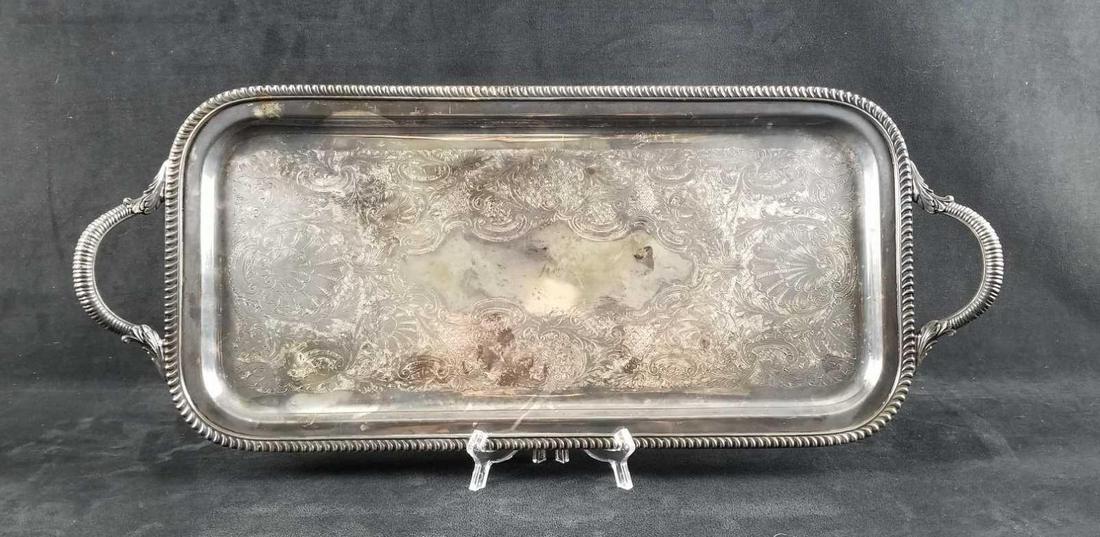 EPC Poole Silver Plated Dragoon Serving Tray: E.P.C. Poole Silver Co, silver plated rectangular serving tray, 20th Century. This try has an ornate design with a dragoon pattern on rim and handles. Makers mark #3211 on the bottom. In vintage condi