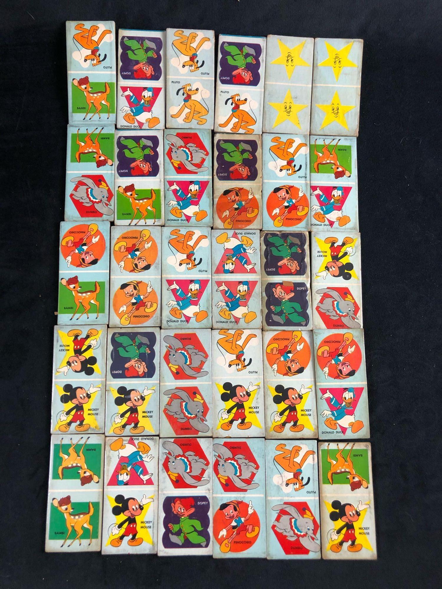Vintage Cardboard Dominoes Disney Games Collectable: Vintage Cardboard Dominoes Disney Games Collectable Characters This is a vintage Disney Domino set of 30. The dominoes are made of cardboard. The characters are depicted in color dancing and posing. D