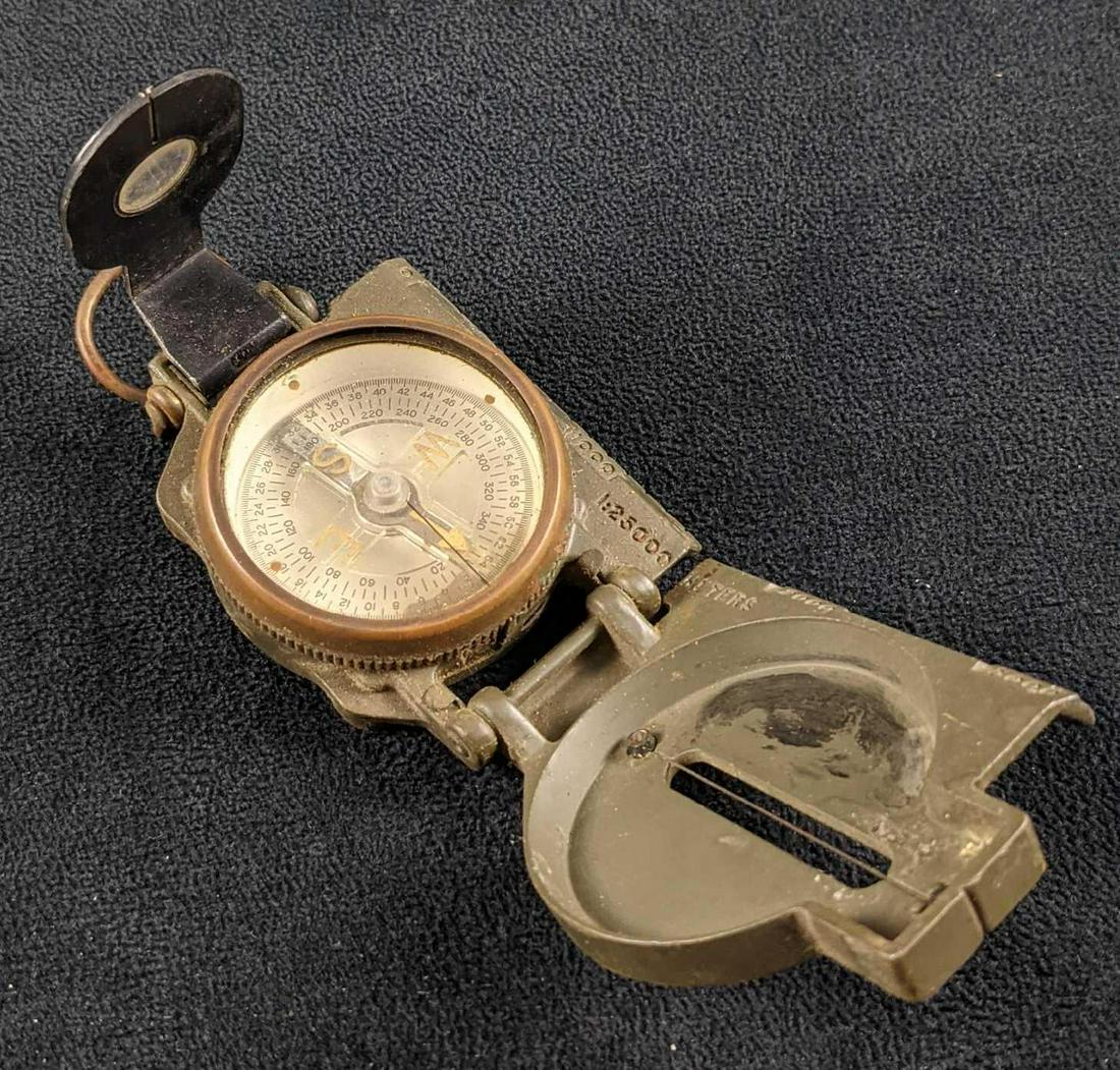 Vintage Brunson US Military Lensatic Compass: Vintage Brunson US Military Lensatic Compass. Folds up for easy storage. Made by the Brunson Instrument Company. Made in the 1960s. Is approx 3" x 2 1/4" x 1" when folded. Is 6 1/2" x 2 1/4" x 2" when