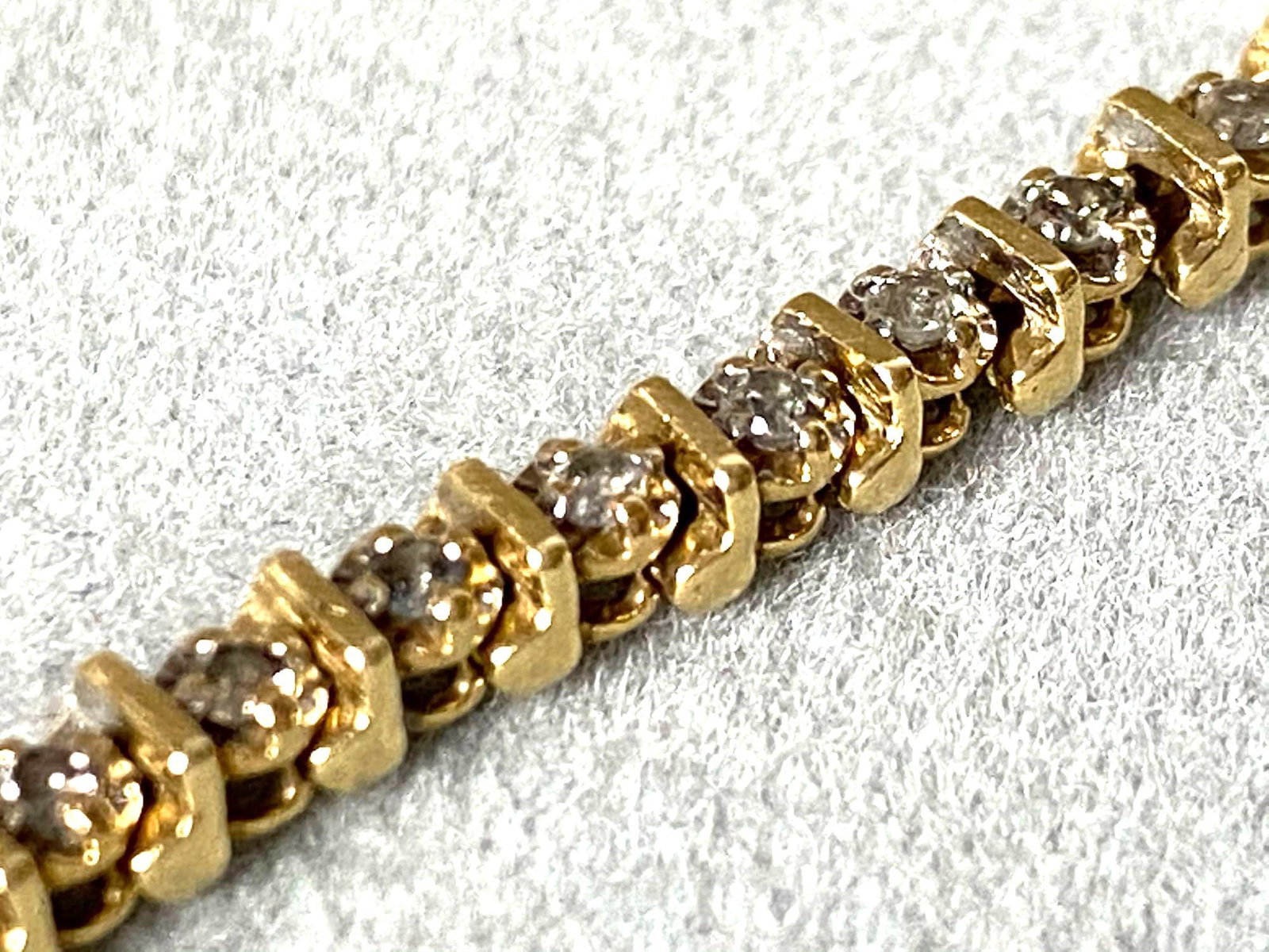 Vintage 14K Gold Natural Diamond Tennis Bracelet: This petite classic tennis bracelet very good like new condition.Please view all our pictures prior to bidding,they are part of our description.All items have been acid tested for authenticity prior t