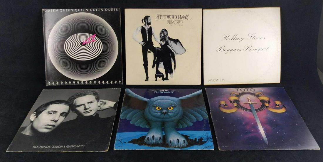 Six Classic Rock Folk Rock Vinyl LPs Queen Rush: This lot includes: (1) Simon & Garfunkel: Bookends. 1968.Columbia Records. (1) Rush: Fly By Night. 1975. Phonogram. (1) Toto (Self-Titled LP) 1978.Columbia Records. (1) Queen: Jazz. 1978. Electra Reco