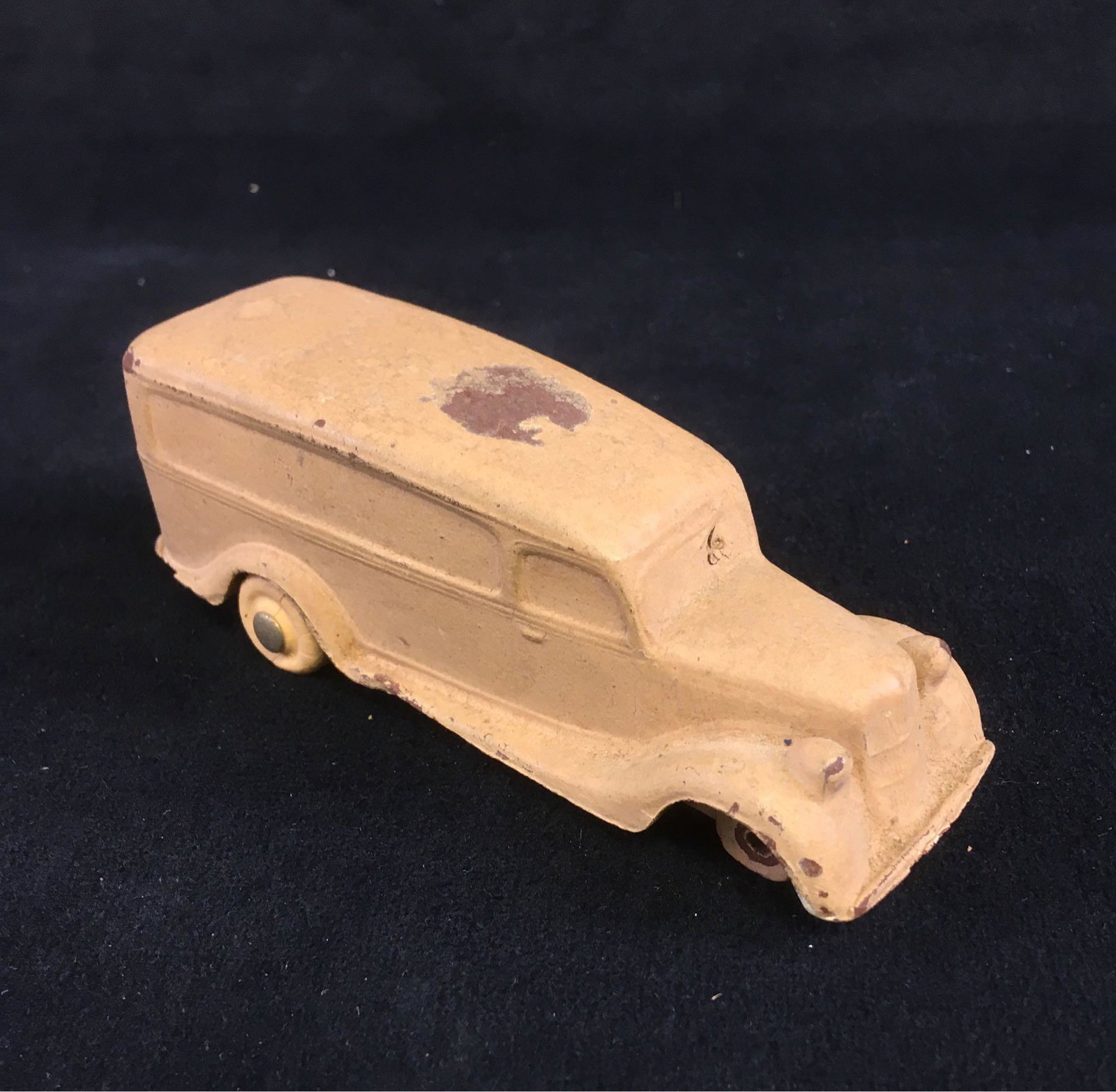 Sun Rubber Ambulance Hearse Toy Car: Vintage toy hearse/ambulance car from either the Sun Toy or Rainbow Rubber Company. 4.1/4" L, 1.1/4" W, 1.1/2" H. it is in poor condition with the front axle and wheels missing, several scuffs and non