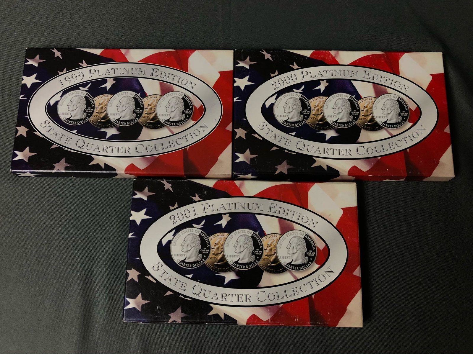 1999 - 2001 Platinum Edition Mint State Quarter: 1999 - 2001 Platinum Edition Mint State Quarter Collection W/ COA & Boxes. Total of 3 sets. Please see all our pictures they are part of our description.