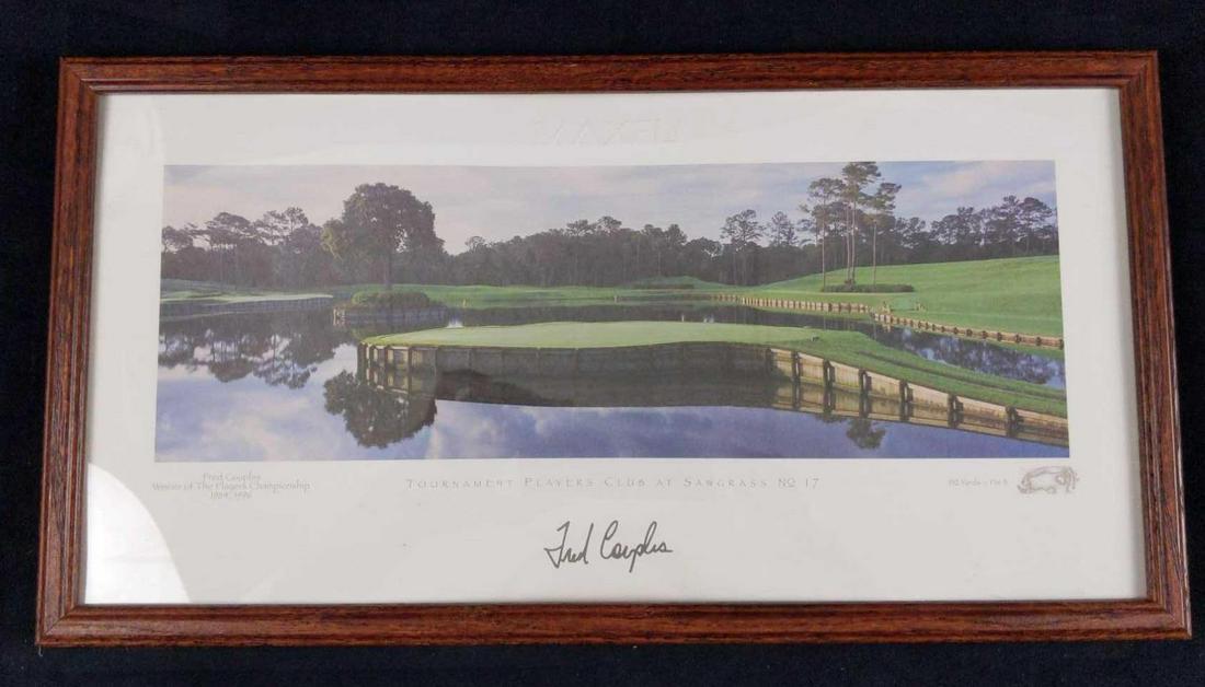 Fred Couples Autographed Players Championship Print: Autographed print of the 'Tournament Players Club At Sawgrass #17, where Fred Couples won the Players Championship in 1984 and 1996. The print is signed by Fred Couples near the bottom center. This pr