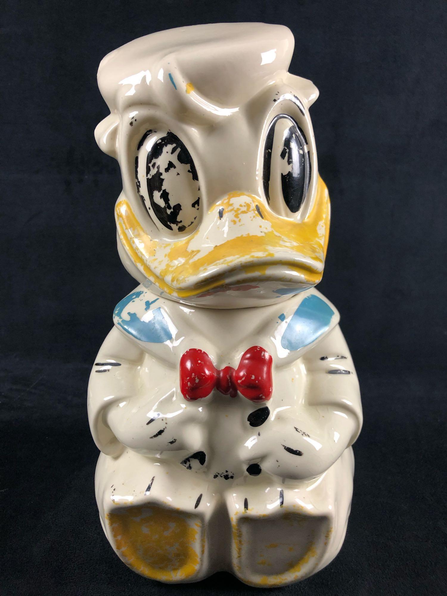 Vintage Turnabout Donald Duck Jose Caroica Cookie Jar: Vintage Turnabout Donald Duck Jose Caroica Cookie Jar Three Caballeros Disneyana Kitchen 1940' This highly 1940's collectible turnabout Cookie Jar has Donald Duck on one side and the parrot Jose Cario