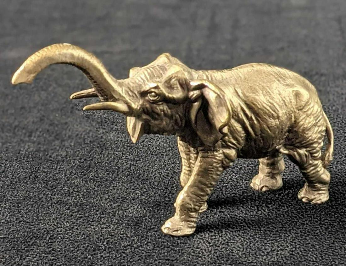 Hudson Pewter Elephant Figurine: Hudson Pewter Elephant Figurine With Lot Of Detail. Perfect for table-top RPGS or as a lucky little figurine to add a little touch of the jungle to your home or office. Is approx 5" x 1" x 3" and is i