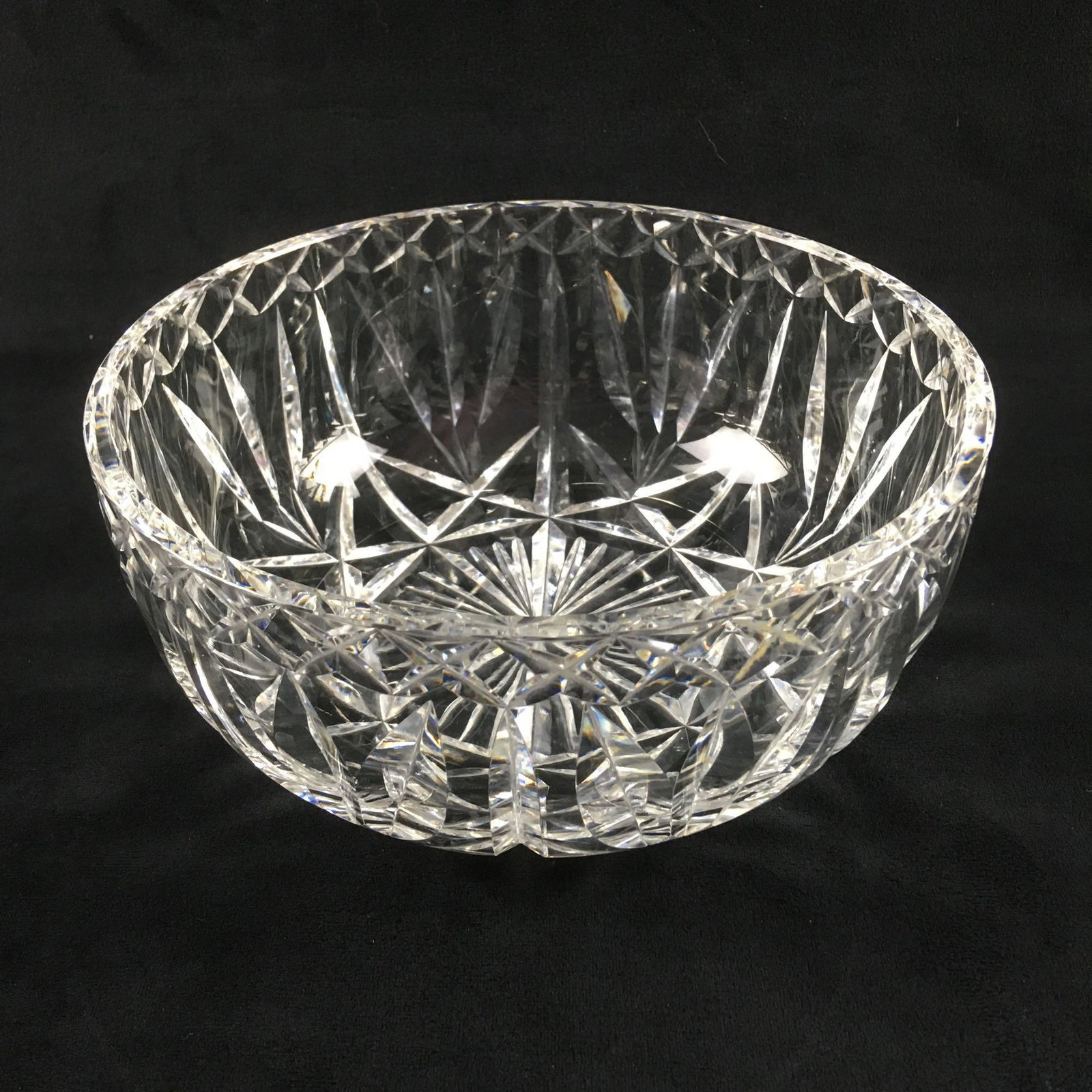 Vintage Waterford Fine Clear Cut Crystal Bowl: Vintage Waterford Fine Clear Cut Crystal Bowl; a very nice crystal bowl with sharp deep cuts. The cut design shows a leaf motif that easily catches light. It is marked Waterford on the inside. It is i