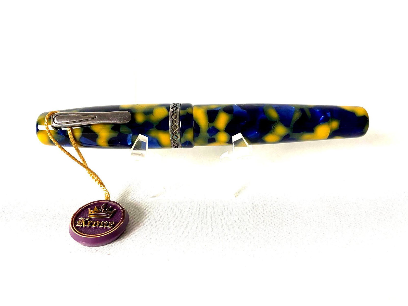 Krone Blue & Gold Sterling Fittings Stretch Ball Pen W: Krone Stretch Ball pen, screw cap Beautiful Blue & yellow gold chunk resin, sterling silver fittings Lightly used Like new with ink , with box & papers Stretch Ball pen in Blue & yellow gold chunk res