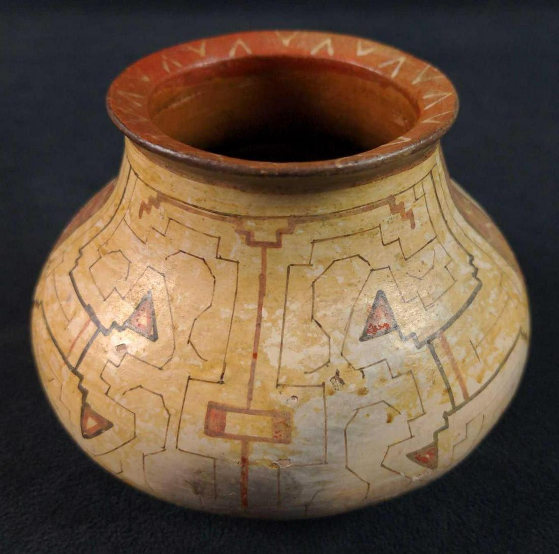Vintage Handmade Conibo Indian Perusa Pot: Vintage Hand-Made Conibo Indian Pot. Is approx 5" x 5" x 4" and is in a good, vintage condition with some wear, scratches, and markings. The Shipibo and Conibo tribes live in the jungle in north-easte