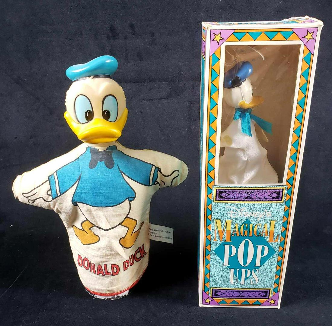 2 Disney Donald Duck Cloth Puppets: 2 Disney Donald Duck Cloth Puppets. This lot of Donald Duck puppets is in overall good to great used condition. The items included and specific notes are as follows: 1 Disney's Magical Pop Ups hand cr