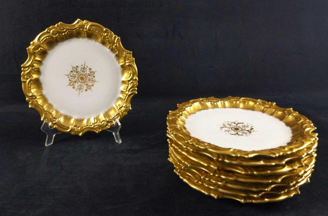 8 Antique Limoges Gold Tressemanes And Vogt Plates: Eight antique (Late 1800's) Tressemanes And Vogt Dessert Plates with ruffled gold borders. Plates are approx 9 1/2" across. Plates are in good, antique condition with some wearing, usually in the cent