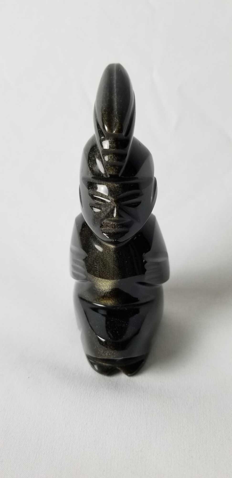 Vintage Black Marble Hand Carved Totem Figure: Vintage Black Marble Hand Carved Totem Figure has a tiki aesthetic. This black marble has a gunmetal sheen when rotated in the light. Maker and date is unknown. In good vintage condition, defects note
