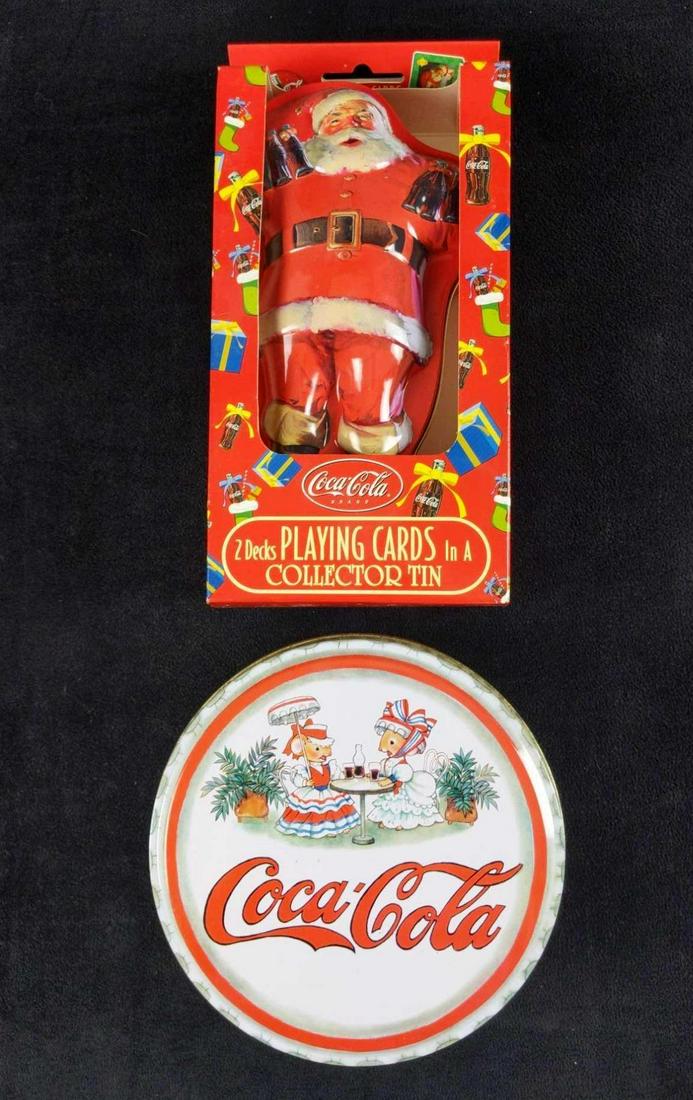 Coca Cola Santa Playing Cards And Mice Ornaments: Both of these would be the perfect gift for Coca Cola fans! This lot includes: (1) Coca Cola Santa Claus Tin With Two Decks Of Playing Cards. Comes in its original packaging which is approx 4 1/8" x 2