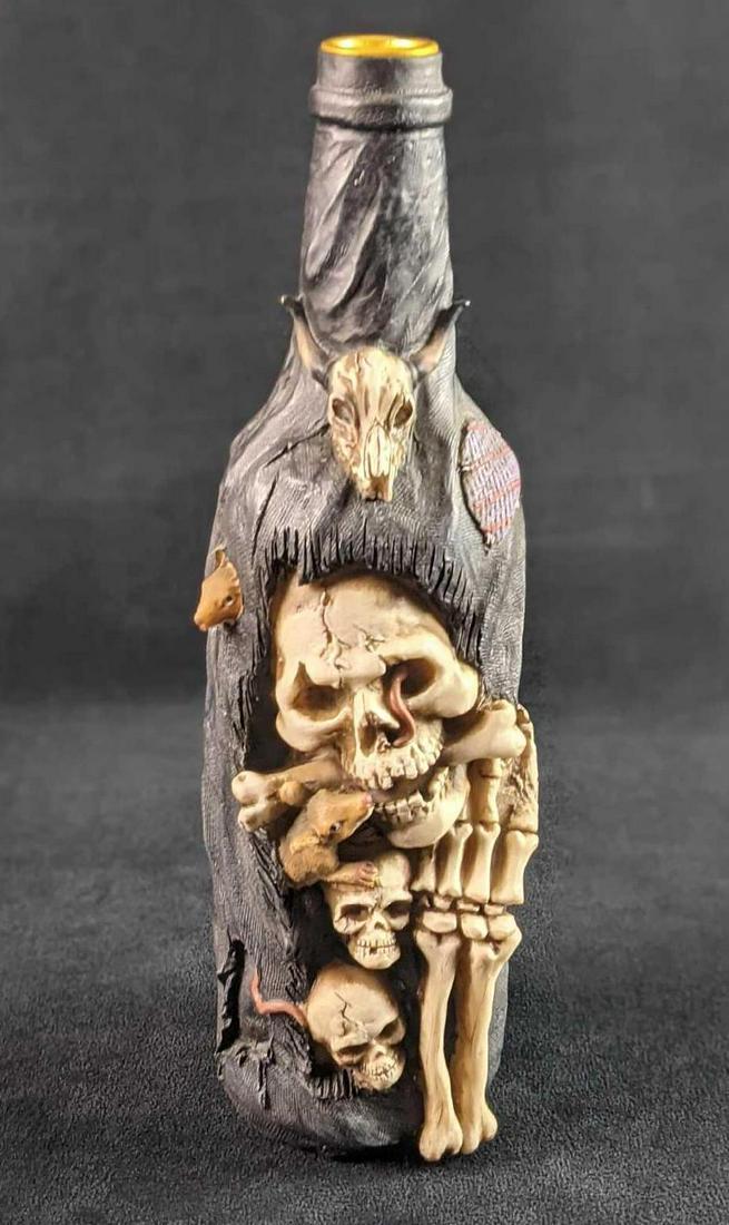 Spooky Rat And Skeleton Black Bottle Halloween: Here is a perfect candlestick for your Halloween or creepy themed room. This candlestick holder looks like a bottle that has rats and bones inside! Yikes! Made of resin, this bottle is approx 3" x3" x
