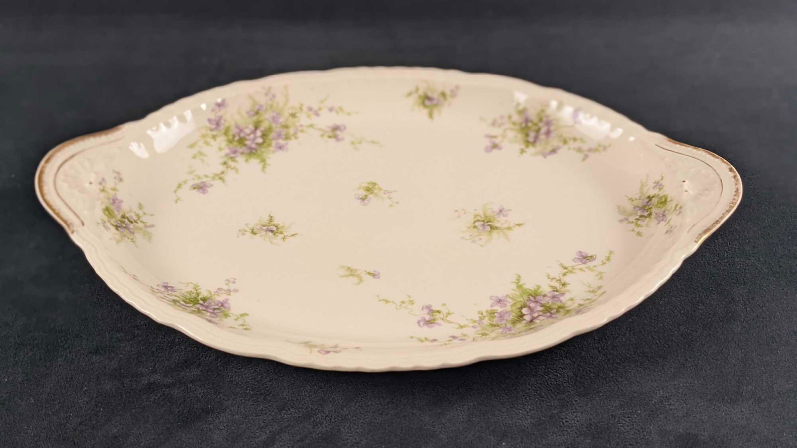 Vintage Fine China Haviland Limoges Platter French: Vintage Fine China Theodore Haviland Limoges Serving Platter. Made in France. Has little purple flowers and vines pattern. Is approx 16" x 11" x 2". Is in a good, vintage condition with some wear on t