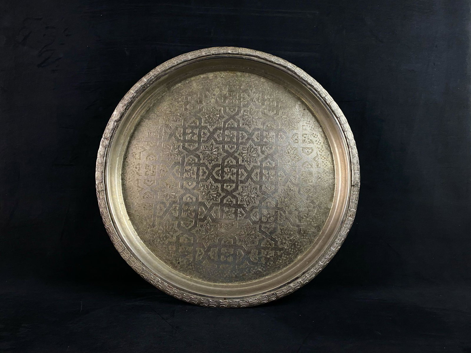 Vintage Large Signed Middle Eastern Islamic Etched: Vintage Large Middle Eastern Islamic Etched Round Serving Tray This vintage tray is in very good condition with signature on back as pictured. Measurements are 24" round 6.25 lbs
