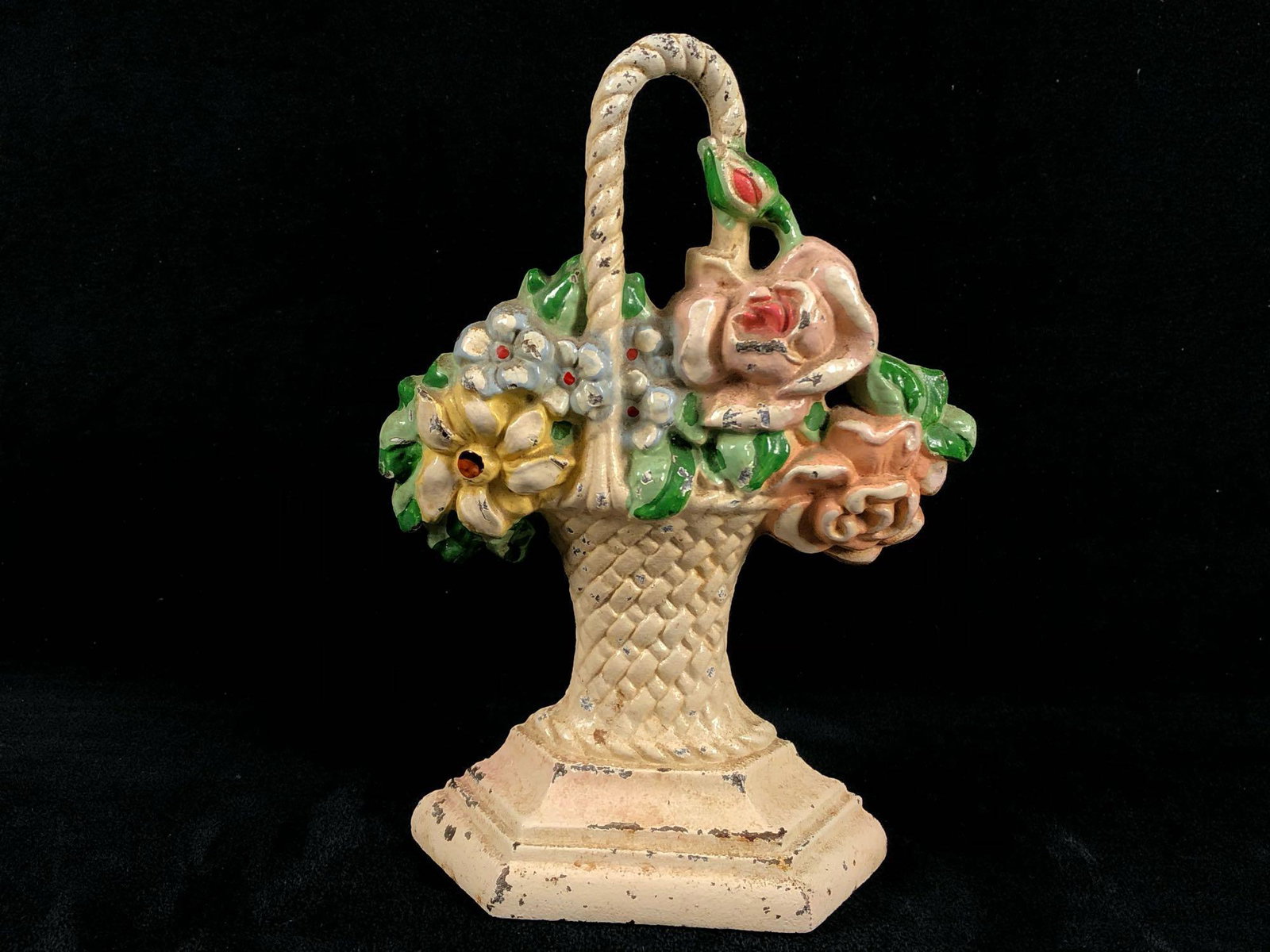 Antique Cast Iron Original Judd Co # 152 Hand Painted: Antique Cast Iron Original Judd Co # 152 Hand Painted Basket Of Flower Door Stop. This stunning item is in Good condition with sighs of paint loss and chipping can be expected. Amazing naturally distr