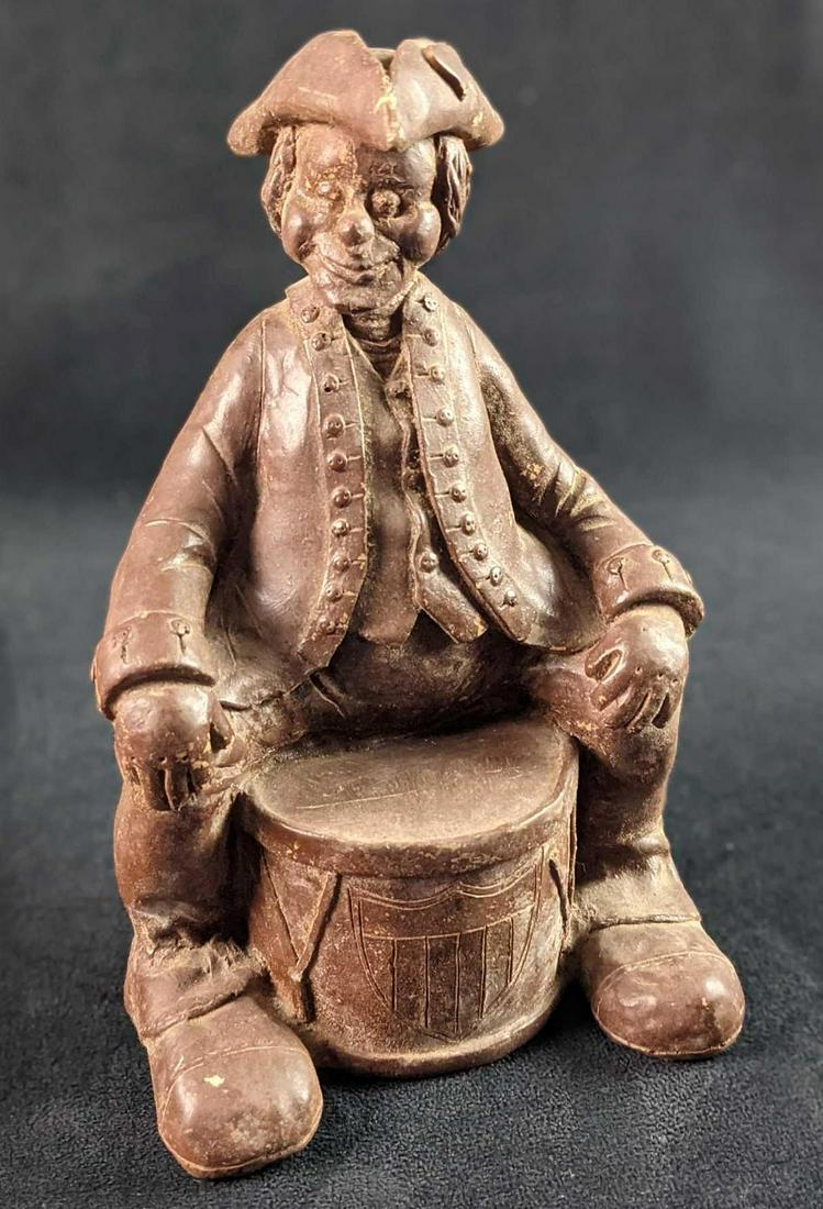 Hand Carved Vintage Wooden Patriot On Drum American: Here is a wood, hand-carved figurine of a stout fellow dressed in old American/American Revolutionary clothing. He was marked by the artist with an SA and 1987. Figurine is approx 6" x 3" x 9". The fi