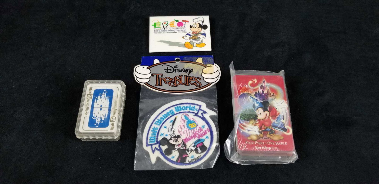 Walt Disney World and Mickey Mouse Card Patch Lot of 4: This lot contains: 1- Sealed deck of mini Walt Disney World cards. Comes in a plastic carrying case. Approx. measures 1 1/2" x 2 1/4" x 3/4"(height of case) 1- Four Parks One World, sealed deck of pla