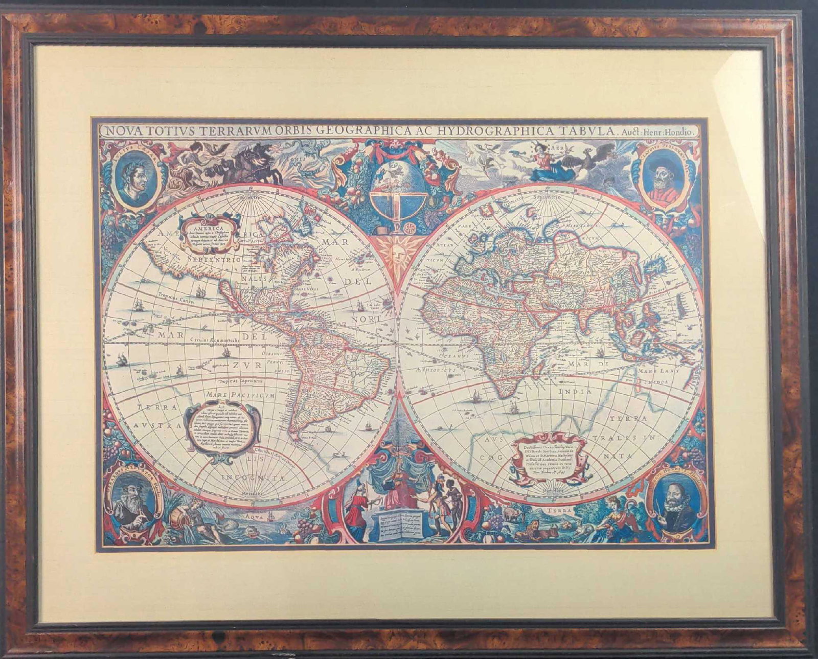 Framed Willem Janszoon Blaeu Old And New World Map: "Nova Orbis Geographica Ac Totius Terrarum Hydrographica" by Willem Janszoon Blaeu Framed Print. Framed print is approx 30 1/4" x 1" x 24 1/2". Map is approx 22 1/2" x 16" and is in a good, vintage co