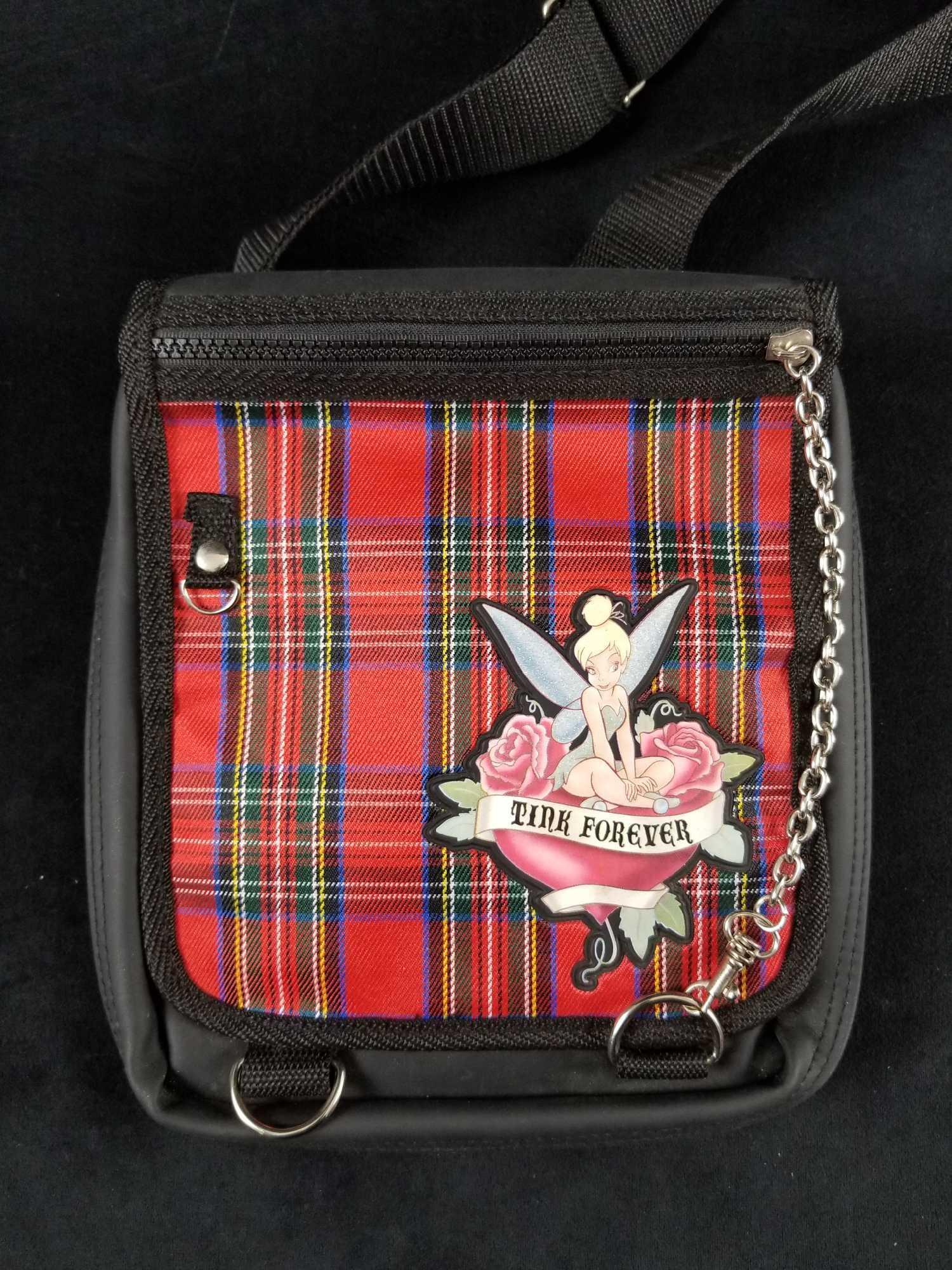 Walt Disneys Tinker Bell Flip Pin Bag with RARE 45: This plaid Tinker Bell flip pin bag features 44 incredible rare and hard to find pins plus 1 keychain! This bag belonged to a long time tinker bell fan and has been preserved with love. Worth mentioni