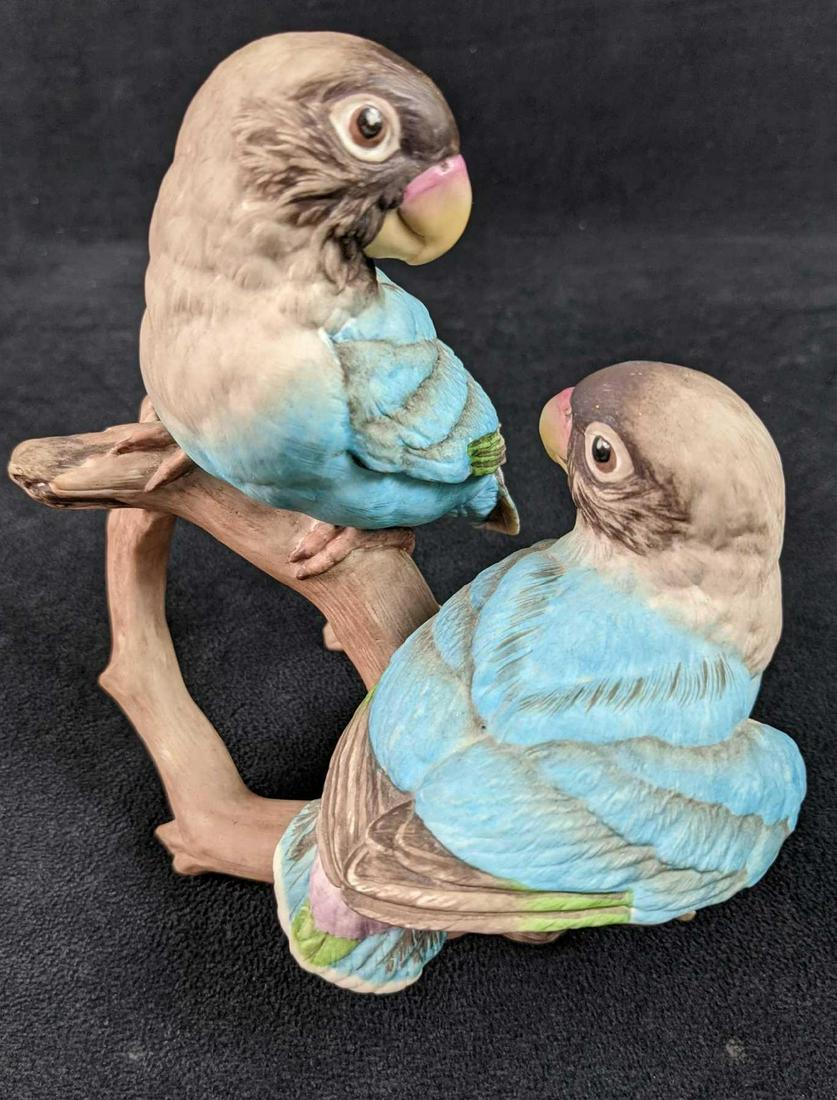 Vintage Bone China Boehm Birds Two Baby Lovebirds: Made of bone china and hand-painted. Is approx 6" x 3" x 6" and is in a good, vintage condition with a light mark/imperfection on the right bird's head. By Edward Marshall Boehm. Made in the USA.